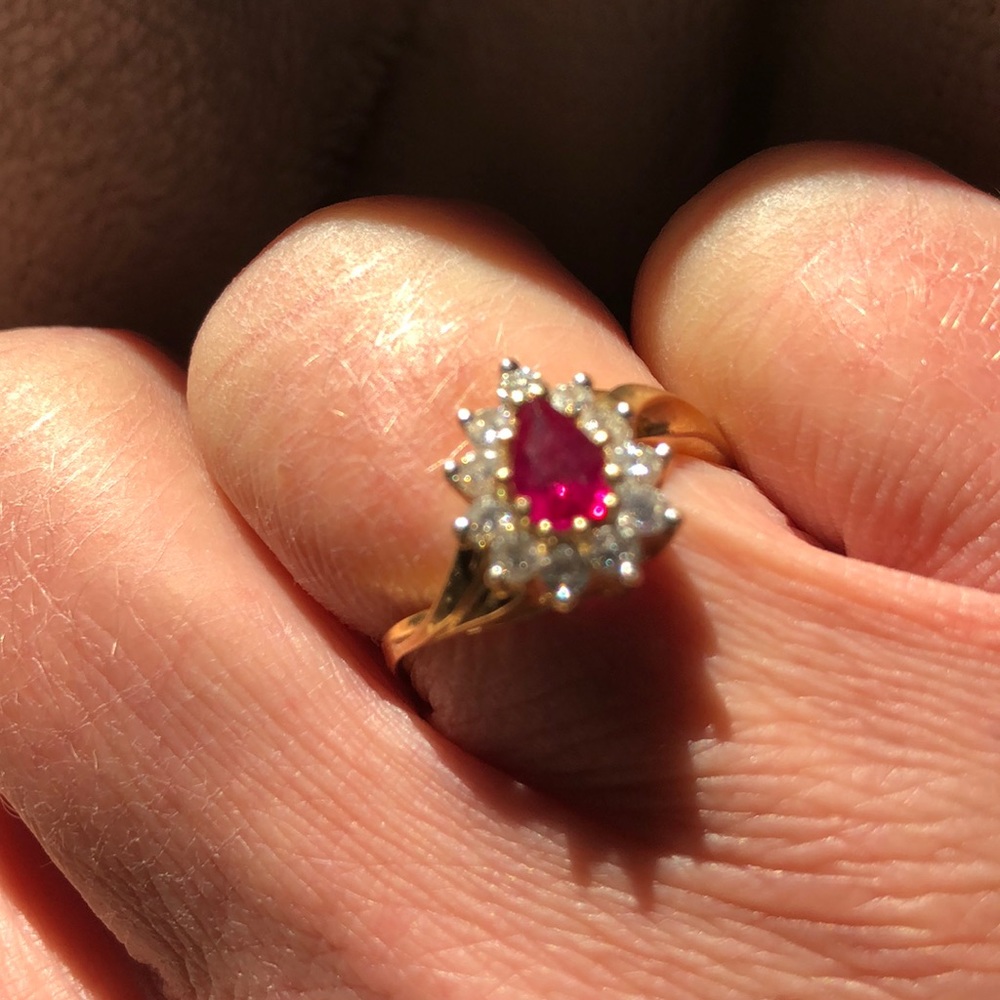 Genuine ruby and diamond ring in 10 k y gold